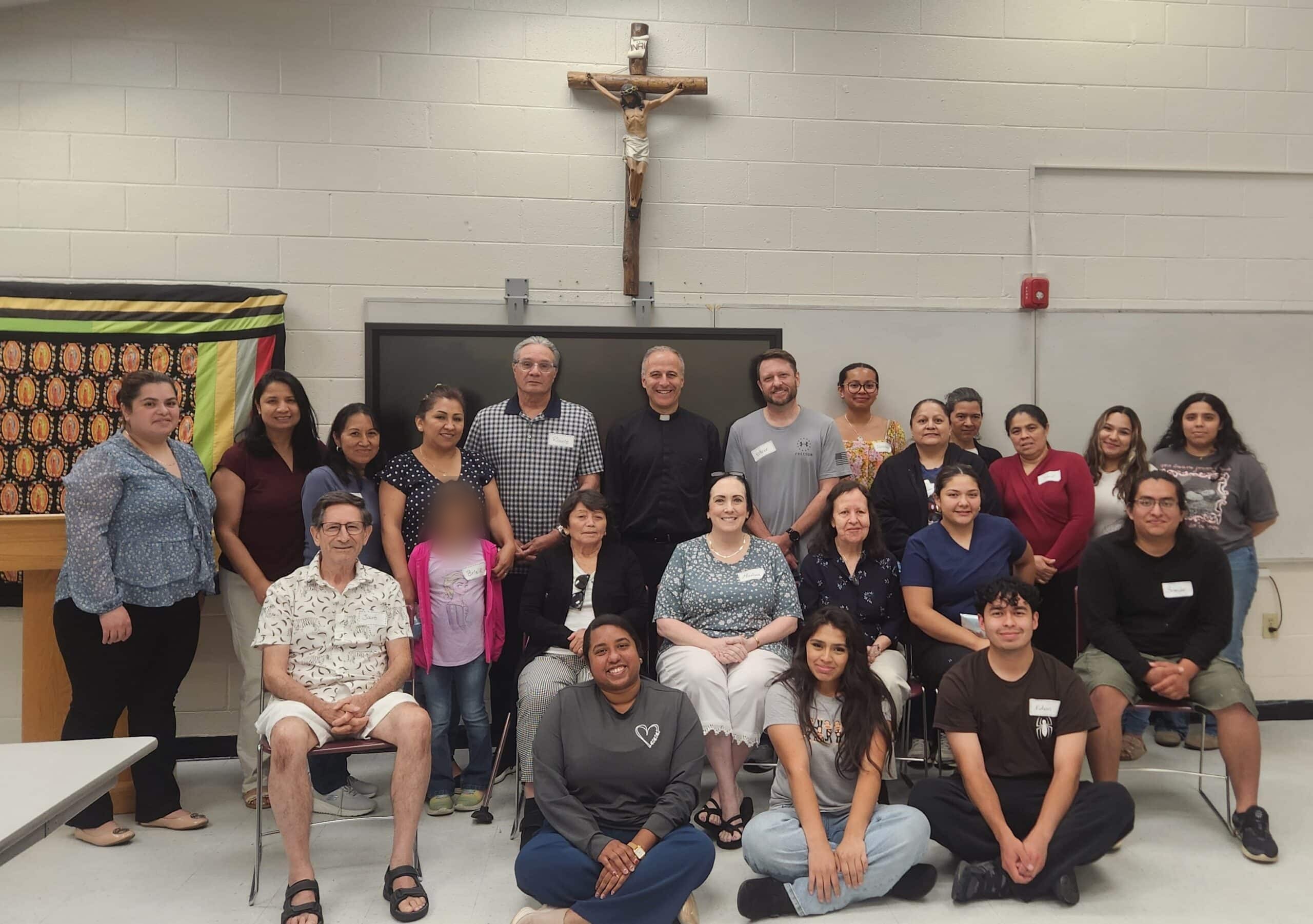 Fr. Álvaro with the parish catechists after their meeting